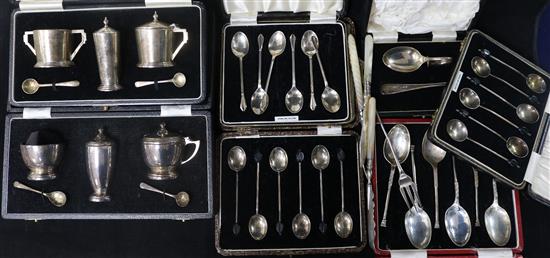 Two cased silver three piece condiment sets, five other cased sets of cutlery and other items.